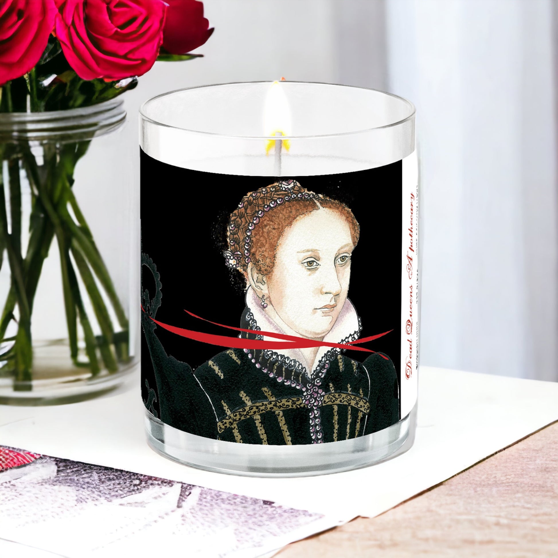 Mary Queen of Scots English Rose Candle on table with roses